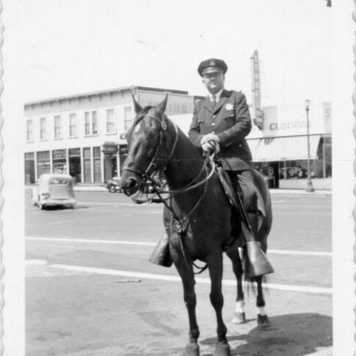 [Mounted police officer Ed Cassidy in Visitacion Valley]