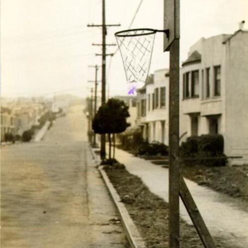 [Basketball net at 22nd Avenue and Kirkham Street in the Sunset District]