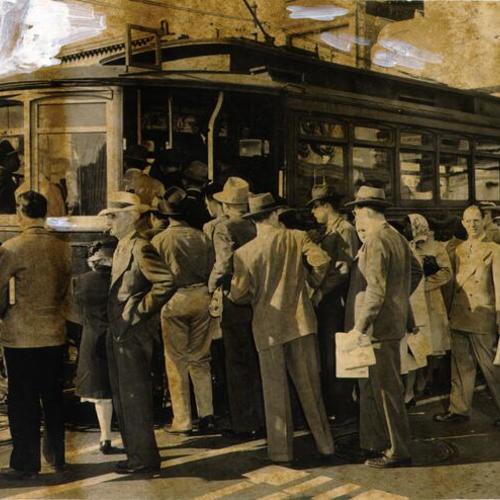[Crowd of people boarding a Municipal Railway streetcar at First and Mission streets]
