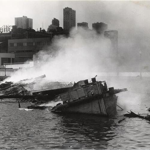 [Remains of the riverboat "Fort Sutter," destroyed in a fire at Aquatic Park]