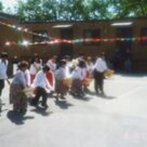[3rd to 5th grade students performing Filipino hat dance for Flores de Mayo at the Filipino Education Center]