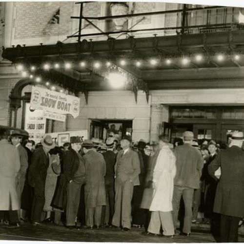 [Crowd outside the Curran Theater]