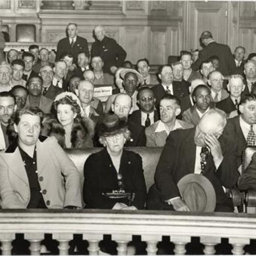 [Striking streetcar employees in supervisors' chambers at City Hall]
