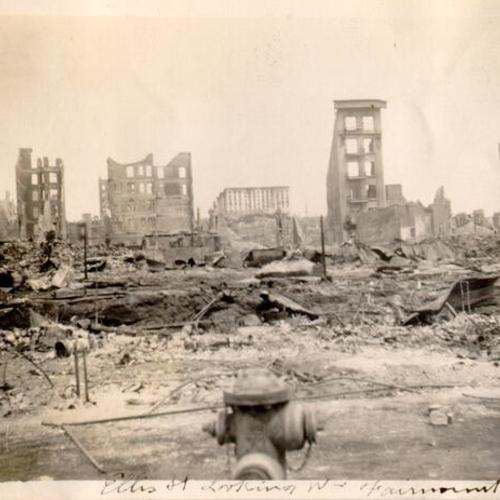 [View north from Ellis Street of ruins caused by earthquake and fire, with Fairmont Hotel in distance]