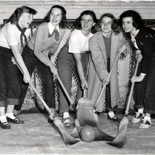 [Camp Fire Girls Shirley Spruitt, Marie Carlsen, Mrs. Marge Zeidler, player coach, Jean Zeidler and Waynette Simpson training for the game against the Galland Laundry Girls]