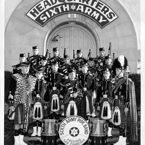 [Sixth Army Pipe Band standing in front of Headquarters Building, Presidio of San Francisco]
