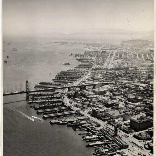 [Aerial view of San Francisco waterfront area showing the Ferry Building and part of the Bay Bridge]