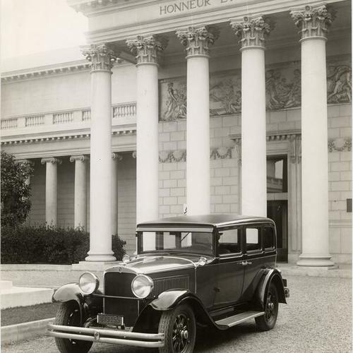 [Automobile parked in the courtyard at the Palace of the Legion of Honor]