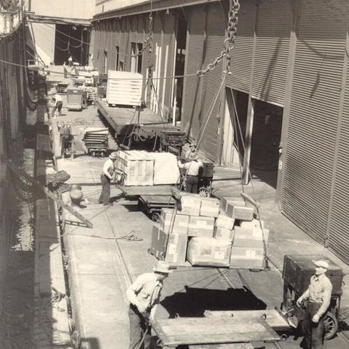 [Loading of goods at dock during waterfront strike]
