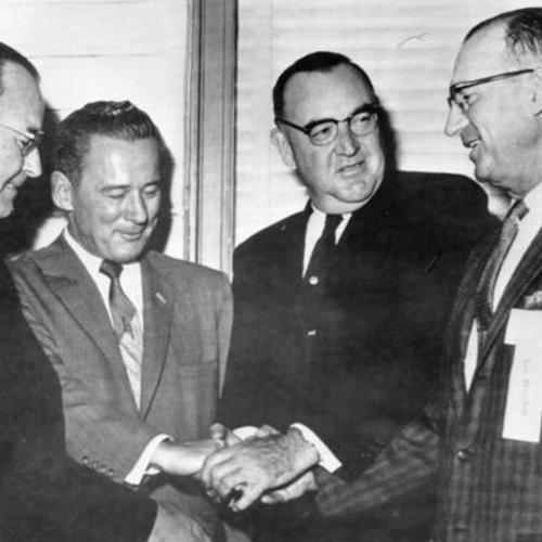 [Rep. Clair Engle (second from left) and Atty. Gen. Edmund G. Brown (second from right) are warmly welcomed to the 48th Annual County Supervisors Association of California]