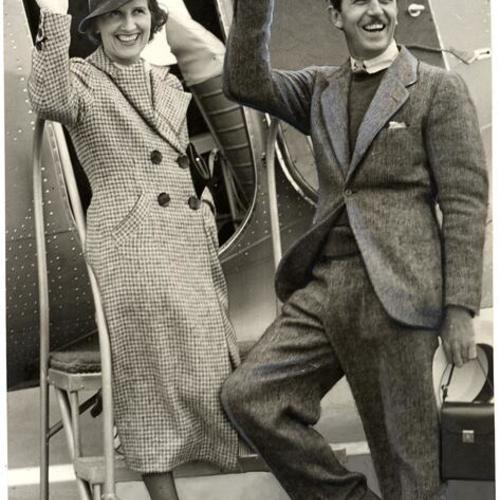 [Walt Disney and his wife boarding a plane for San Francisco]