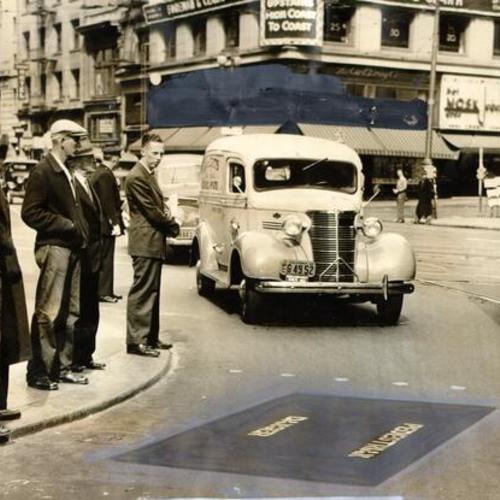 [Pedestrians waiting at the intersection of Fourth and Market Street]
