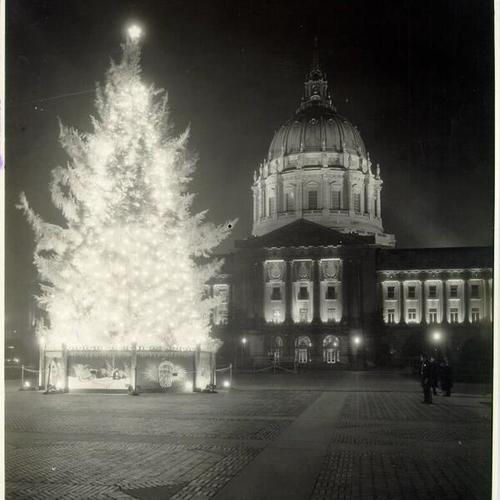[Christmas tree lighting in front of City Hall]