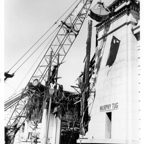 [Building being demolished on Pier 7]