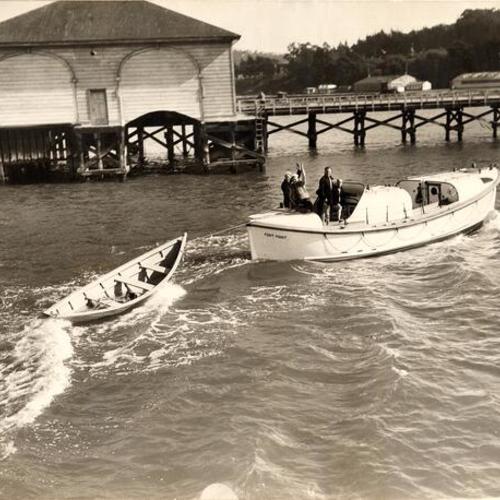 [Four men on a Fort Point Life Saving Station boat]