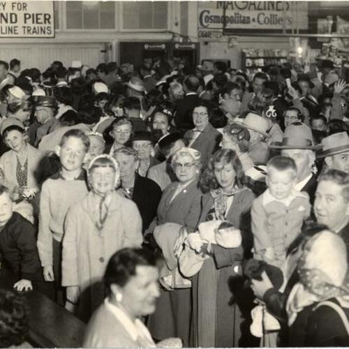 [Crowd at the Ferry Building waiting for "last ride" on ferry]
