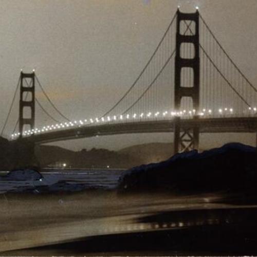 [Night view of Golden Gate Bridge photographed from Baker's Beach]
