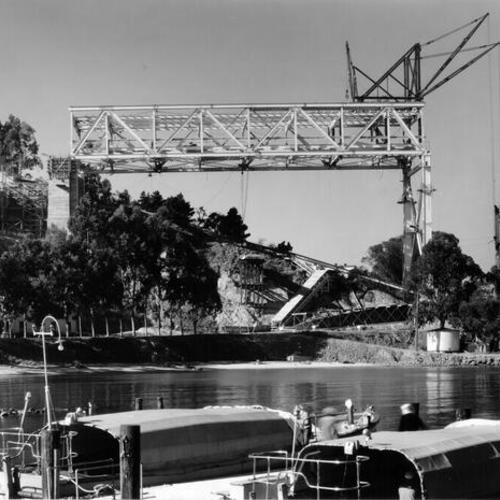 [First truss span is attached to Yerba Buena Island anchorage]