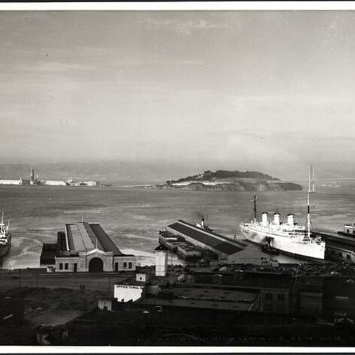[View of piers with Yerba Buena and Treasure Islands in the background]