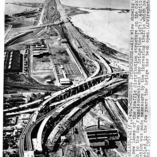 [Aerial view of additional Oakland on-ramps and off-ramps to Bay Bridge under construction]