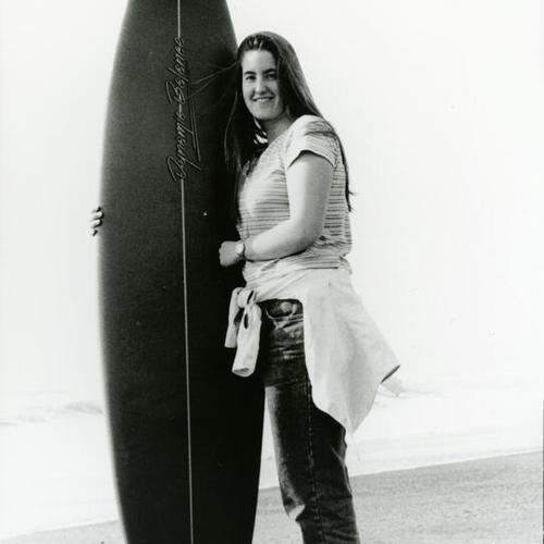 [Katie at Ocean Beach, one of the first female surfers when surge of female surfers began in mid 1990's]