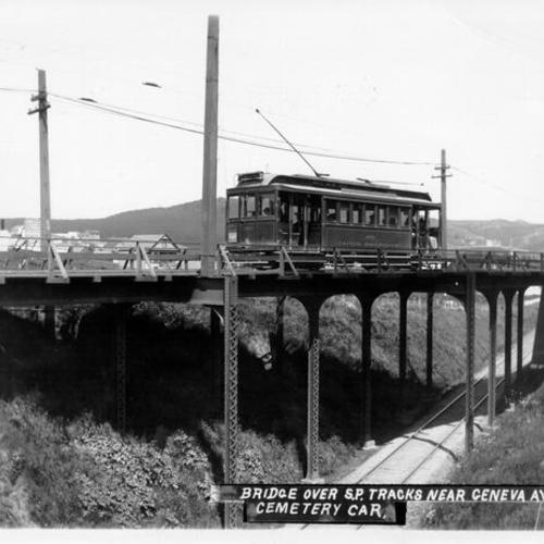 Bridge over Southern Pacific tracks near Geneva Avenue.  Cemetery car