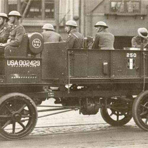 [National Guardsmen protecting a convoy of Belt Line Railroad trucks during the longshoremen's strike of 1934]
