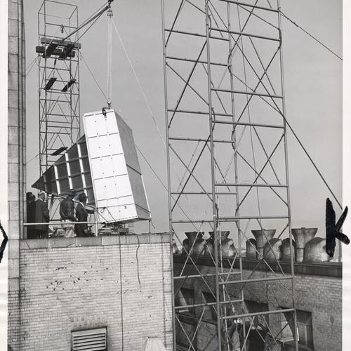 [Installation of antennas on top of Pacific Telephone & Telegraph Company building]