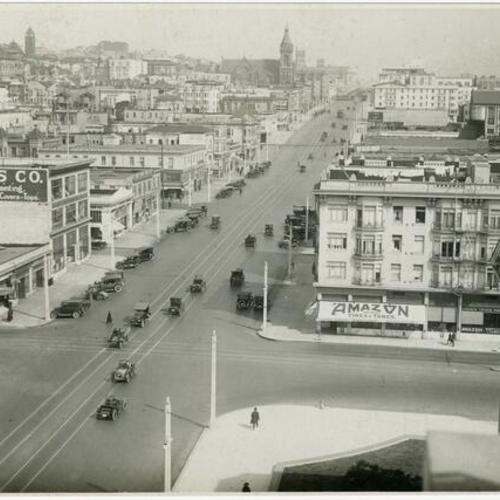 [Aerial view of Van Ness Avenue at McAllister Street]