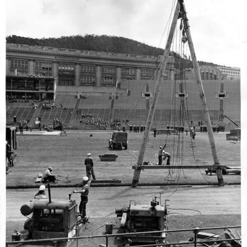 [Workers preparing Kezar Stadium for a War Bond Drive]