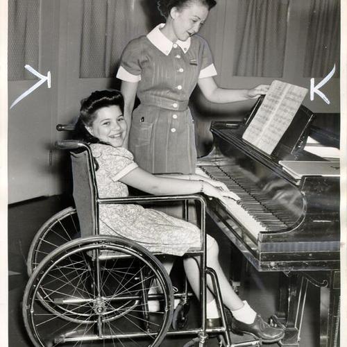[Nurse Sue Gifford and a patient at Children's Hospital]