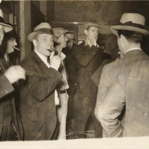 [Harry Bridges and others at a Teamsters Union meeting]