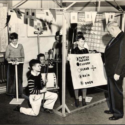 [Students of West Portal Elementary with George L. Edmondson]