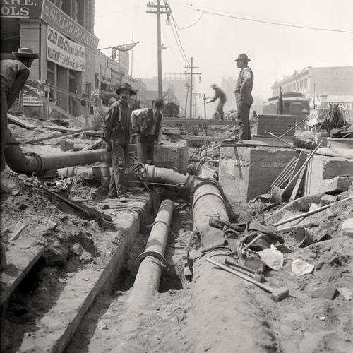[City Pipe System - Raised 16" main on south side, Market Street, opposite Spear Street, view west]
