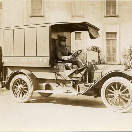 [Two exposition guards on a truck at the Panama-Pacific International Exposition]