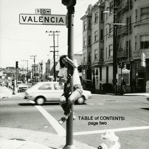 [Woman on traffic light on 900 block of Valencia Street]