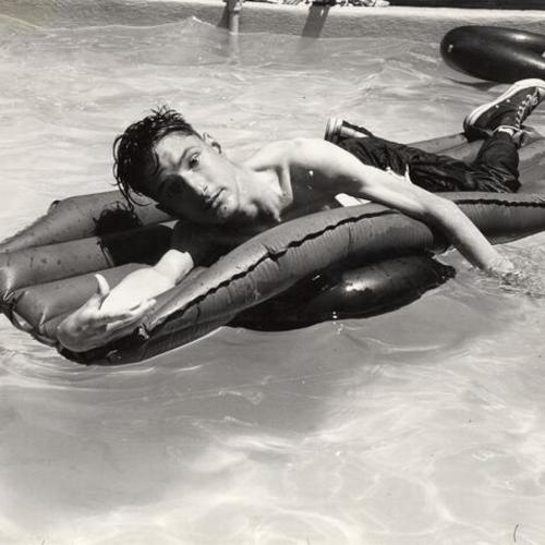 [Young man in swimming pool, Recreation Center for the Handicapped]