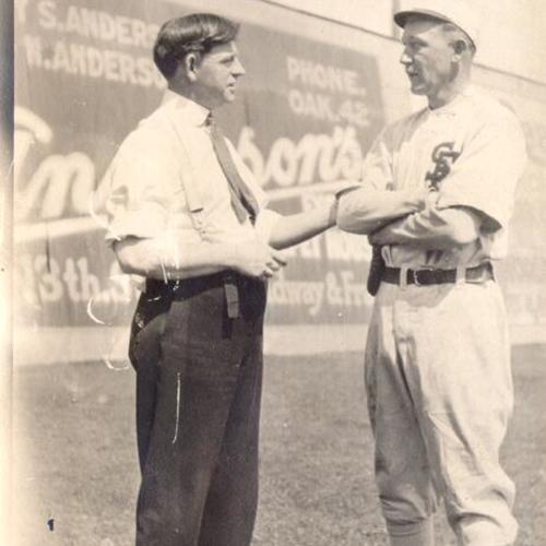 [San Francisco Seals trainer Danny "Doc" Carroll and player Charles Baum at Oakland]