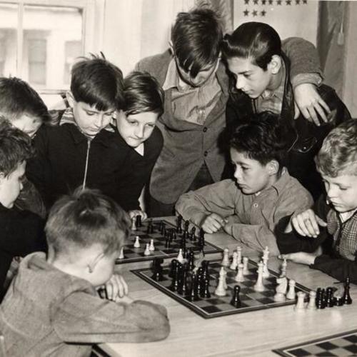 [Columbia Park Boys Club members Donald Birrer, Ronald Keil, Joe Sanchez and Denny Connors playing chess]