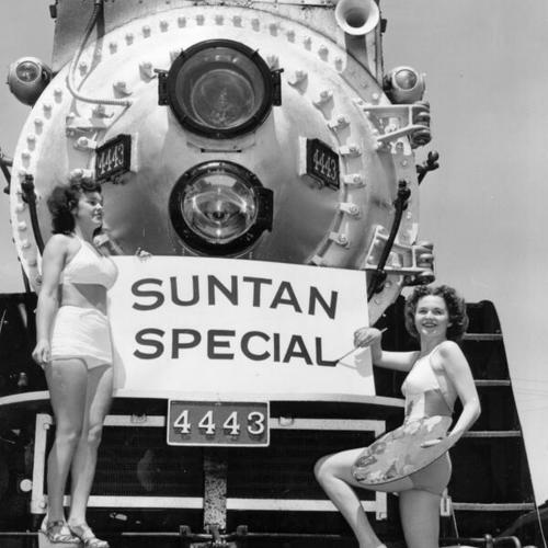 [Louise Wilmot and Nancy Postel putting finishing touches on the "Sun-Tan Special"]