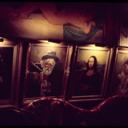 Walls with decorated with paintings at Domino Club