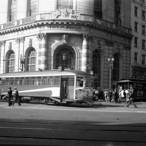 [Market, Eddy and Powell streets looking northwest at #31 line car 978 entering Market street inbound]