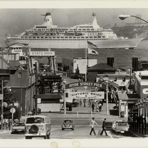 [View of the Hyde Street Pier with ocean liner Island Princess in the background]