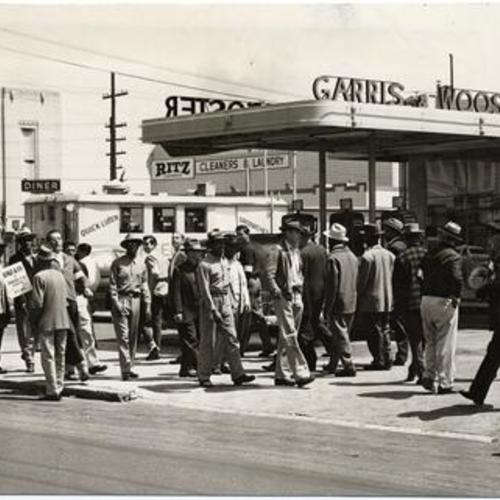 [Members of the Garage & Service Station Employes Local 665 picketing a gas station at Fillmore and Lombard streets]