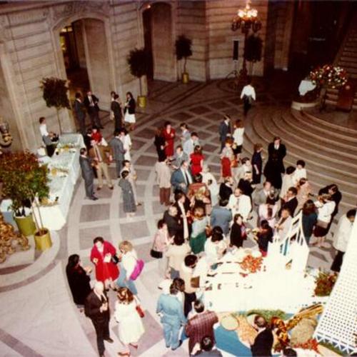 [Social event in the Rotunda of City Hall]