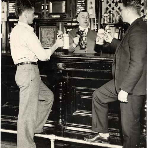 [William Hamilton, bartender Lee Hildebrand and Charles Young in the U. C. Stephen Union Tap Room]