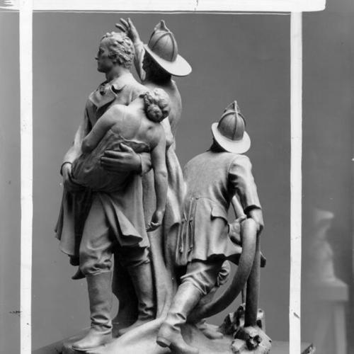 [Bronze statue commemorating the Volunteer Fire Department of 1849 - 1866 by sculptor Haig Patigian]