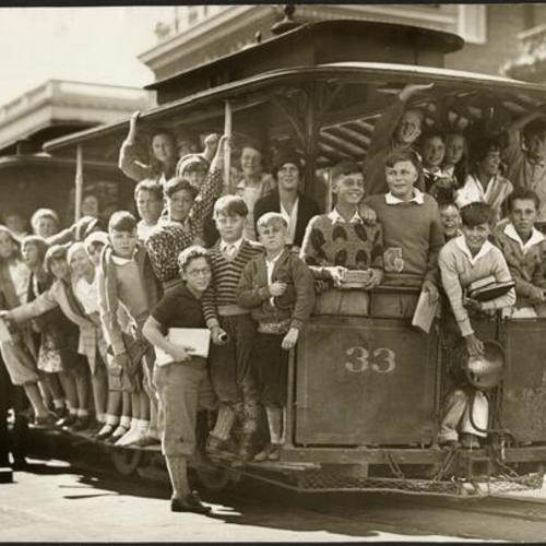 [Group of children on a cable car]