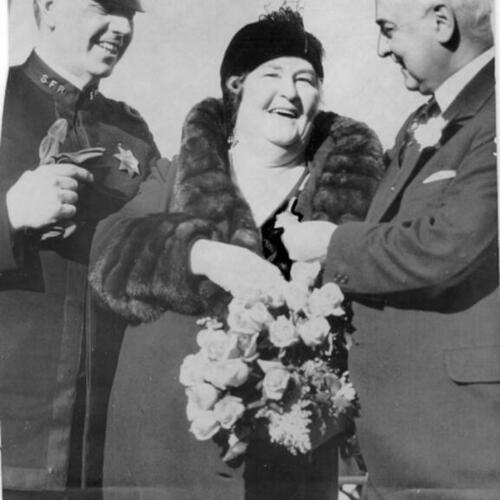 [Annie Laurie with Chief Quinn and Mayor Angelo Rossi]