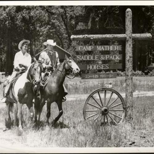 [Doris Perry and Joe Barnes out for a ride at Camp Mather]